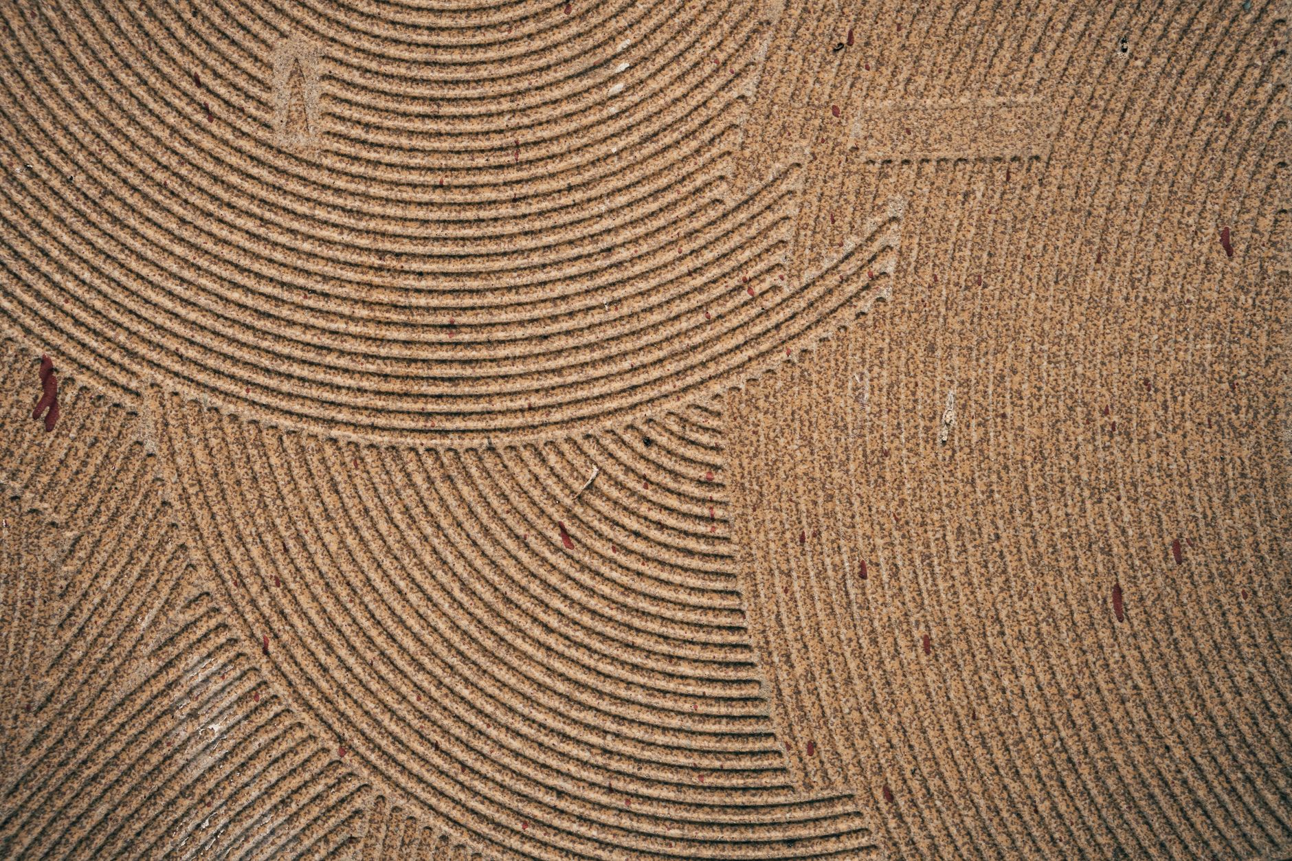 intricate coir mat texture with curved patterns